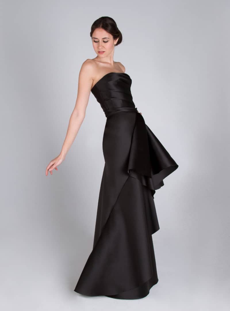 Evening dress designed by CRISTINA SAURA. It consists of draped on her neckline word of honor and bias skirt with fantasy.